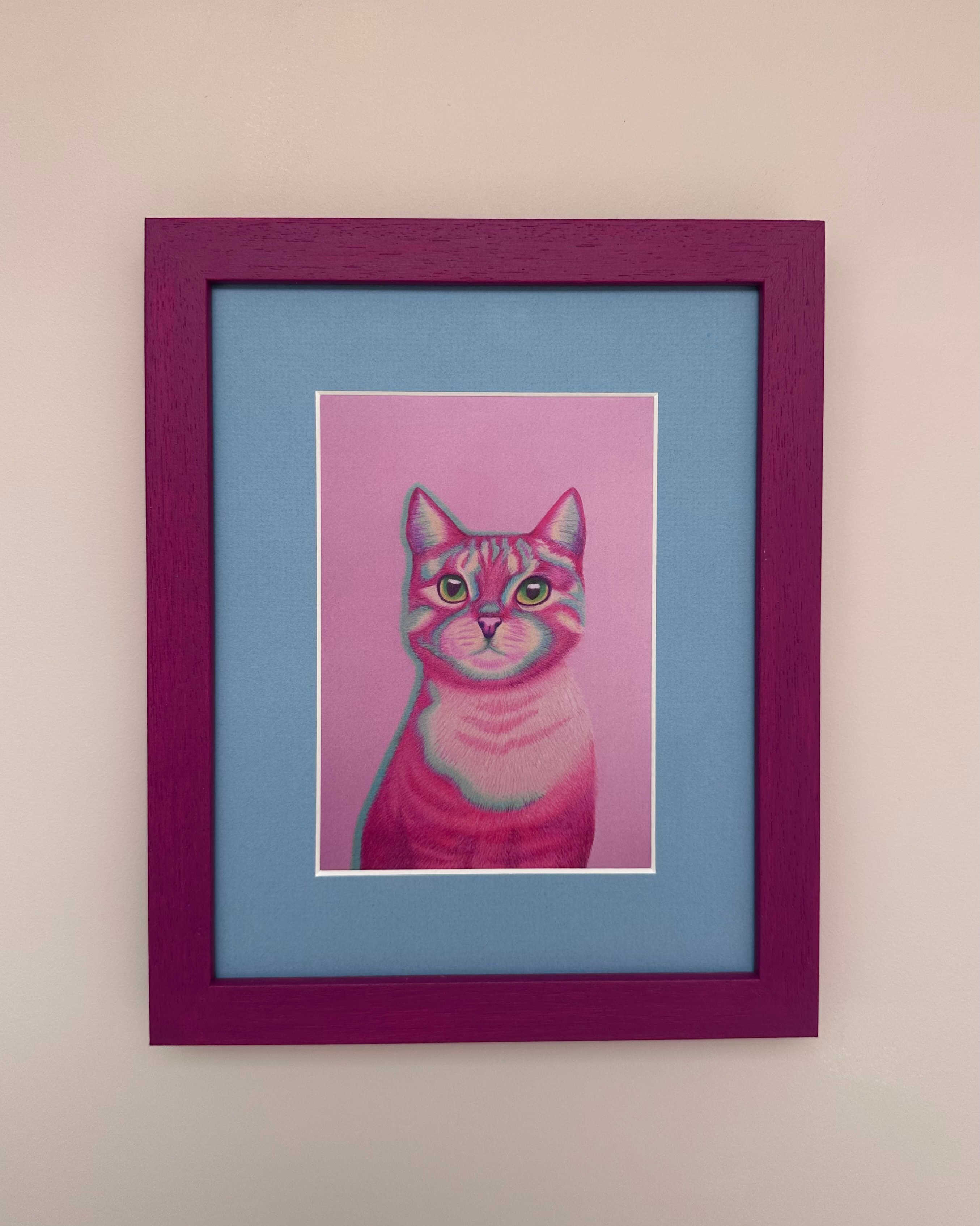 Suzanne Knowles with pink frame
